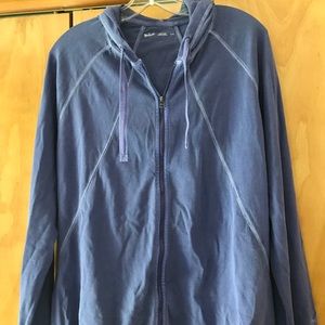 Light purple zip-up jacket.